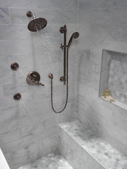 DELTA FAUCET Delta Faucet RP70172RB Universal Showering Single Function Showerhead in Venetian Bronze