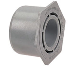 NIBCO 4518 Chemtrol 1-1/2 in. Spigot x 1 in. Socket PVC Flush Bushing - Dark Gray